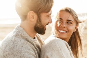 Couple in love in an article by Stefanie Kuhn, LMFT on how to grow deeper emotional intimacy as a couple.