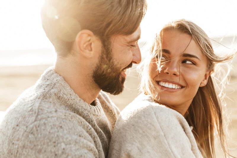 Couple in love in an article by Stefanie Kuhn, LMFT on how to grow deeper emotional intimacy as a couple.