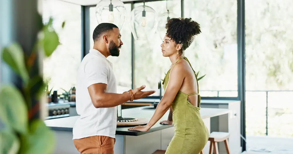 crisis and couple argue in a kitchen with stress