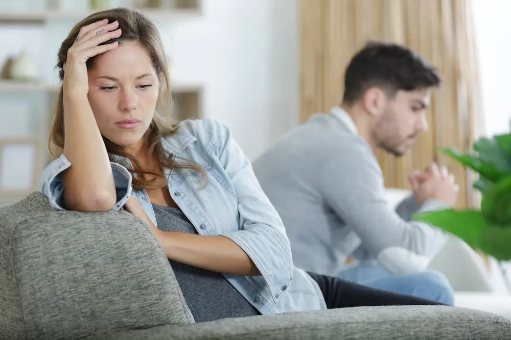 Therapy that works with stefanie kuhn | therapyworks texas Couple sitting apart in emotional distress illustrating relationship conflict marriage challenges and communication struggles